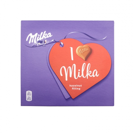 Цукерки 110 г Milka з молочного шоколаду з горіховою начинкою